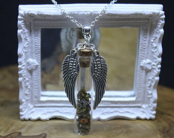 Steampunk Up-cycle Watch Part Pendant Necklace. Vintage recycled wrist watch workings suspended in Miniature Glass Vial. Angel Wing detail.