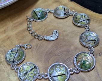 Up-cycled Wrist Watch Parts Glass Cabochon Bracelet. Unique, Steampunk, Neo-victoriana.