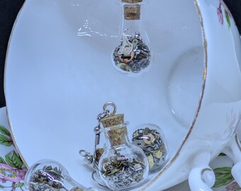 Steampunk Watch Part Earrings in Miniature Glass Vial – Recycled Timepiece Jewelry