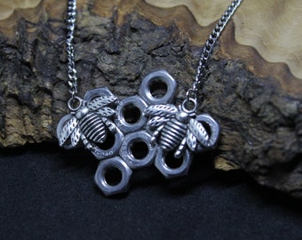 Up-cycled Nuts Honey Comb Bee Necklace. Handmade, unique multi-tone pendant necklace.