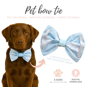 Pode incluir: Um cão marrom usando uma gravata borboleta azul clara com padrões de nuvens brancas. A imagem também mostra uma gravata borboleta separada e o texto "Pet bow tie" e "3 tamanhos".