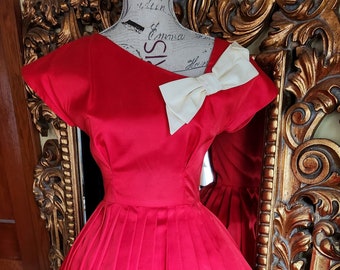 Vintage 50's Red Acetate Fit and Flare Pleated Dress with White Bow Detail and Asymetrical Neckline
