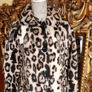White leopard deals coat