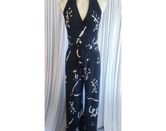 Mono halter blanco y negro de la marca Caché, estilo vintage de los 90.