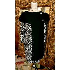 Vintage años 60 negro y blanco abstracto iris floral vestido de vaina con capelet