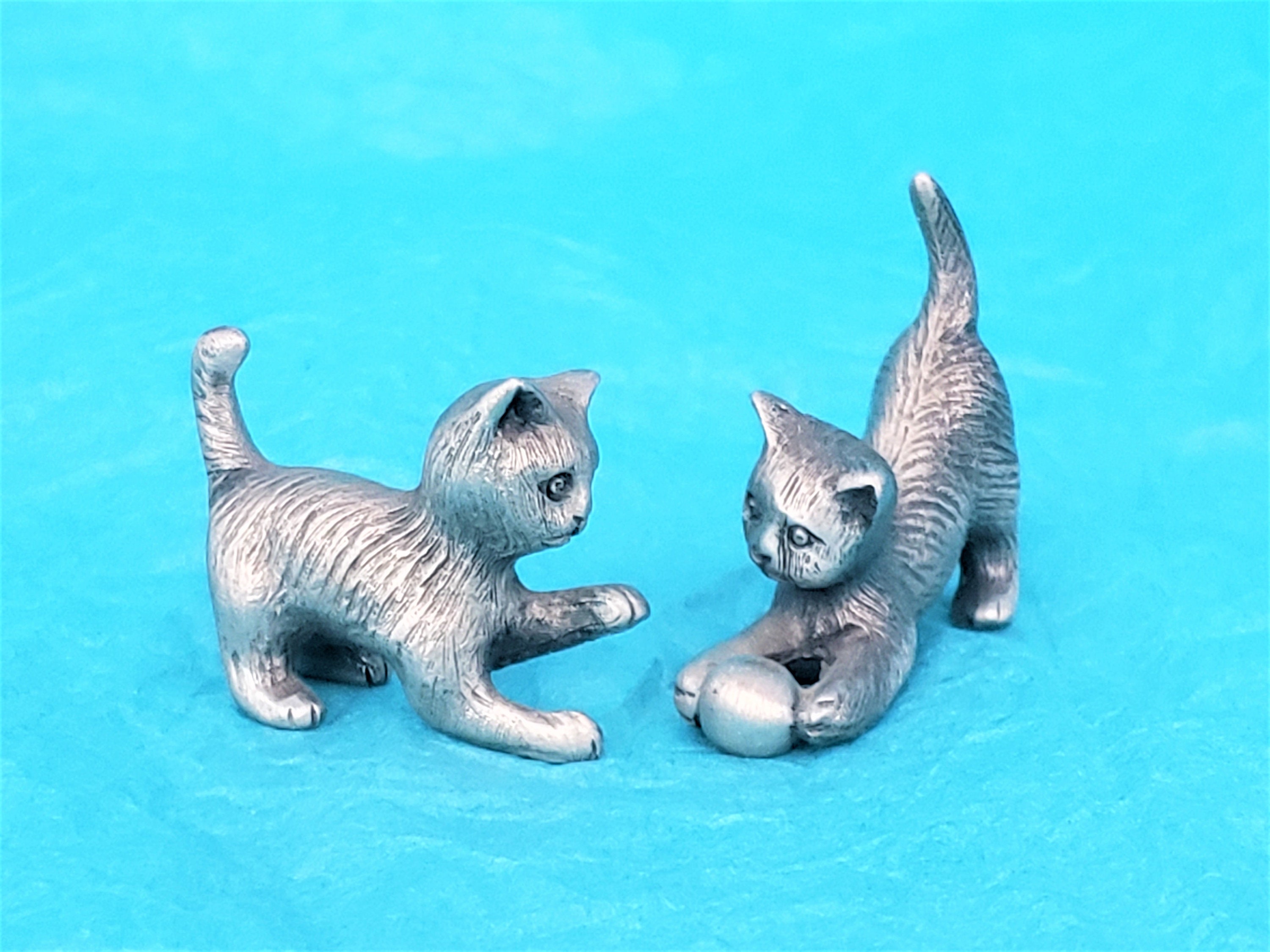 tiny pewter figurines