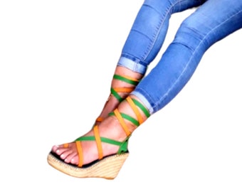 OUTLET 30% esparto wedges. Size 38. Orange and green espadrille with long leather straps. High wedge esparto sandal with adjustable crossed straps.