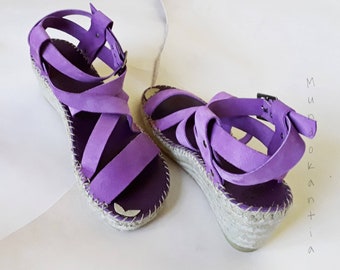 Semi flat espadrilles sandals with crossed leather straps Semi flat espadrilles sandals with crossed leather straps