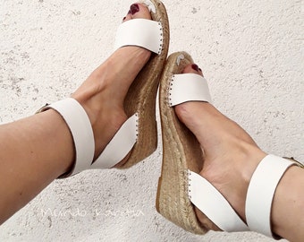 Natural espadrilles for a bohemian bride. White espadrille sandals with wide ankle straps. Boho chic espadrille sandals in soft leather.