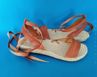 Spadrille eco sandal. Spadrille sandal natural jute sole. Espadrille strips crossed skin. Flat sandal esparto boho. Espadrill boho