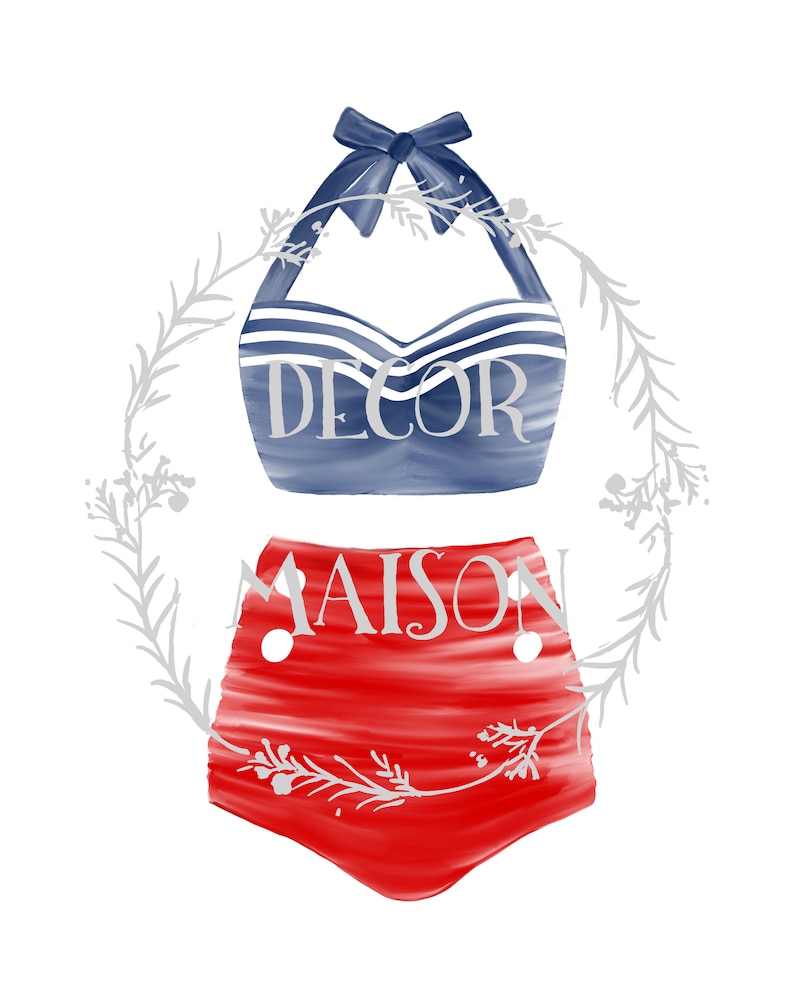 May include: A blue and white striped swimsuit top with a bow and the word "DECOR" printed on it. The bottom is red with the word "MAISON" printed on it. The swimsuit is surrounded by a wreath of white leaves.