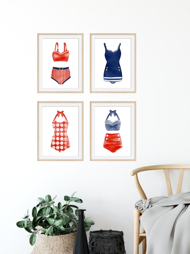 May include: Set of four framed prints featuring vintage-style swimsuit illustrations. Each print features a different red and blue swimsuit design, including a striped bikini, a polka dot swimsuit, and two one-piece swimsuits.