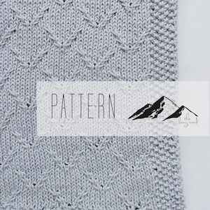 Het Liam-breipatroon babydeken