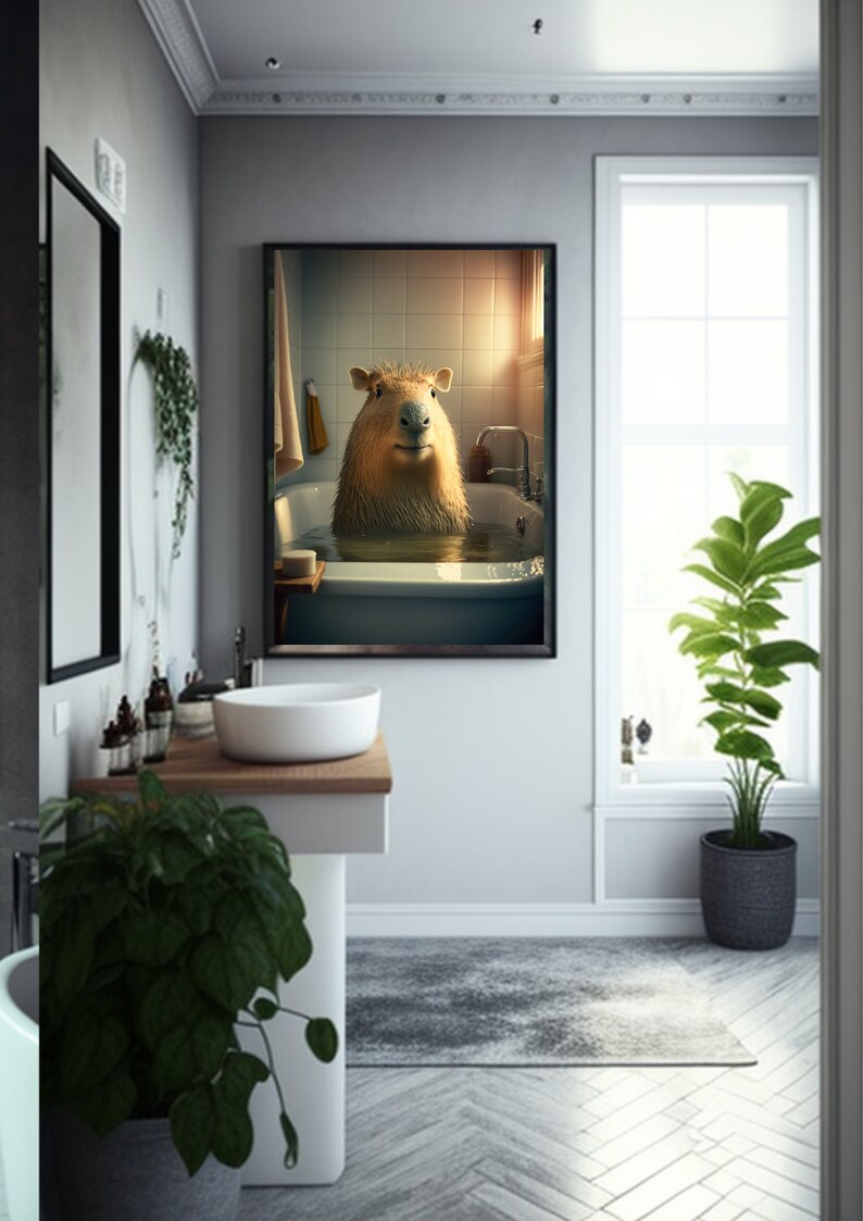 May include: A framed print of a capybara taking a bath in a white bathtub. The capybara is looking directly at the camera with a relaxed expression. The bathroom is tiled in white and has a window with a view of the outside.