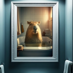 May include: A white framed mirror with a capybara in a bathtub. The capybara is looking directly at the camera. The bathroom is tiled in white.