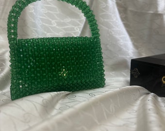 Pochette fatta a mano con bordino verde per eventi o matrimoni