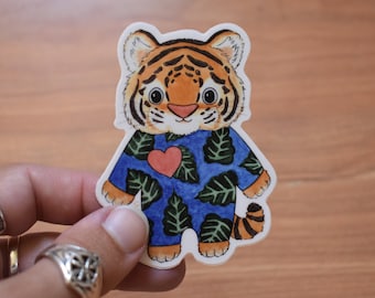 Tiger Cub in Pajamas Vinyl Sticker, Cute Baby Tiger in Leaf PJs Decal