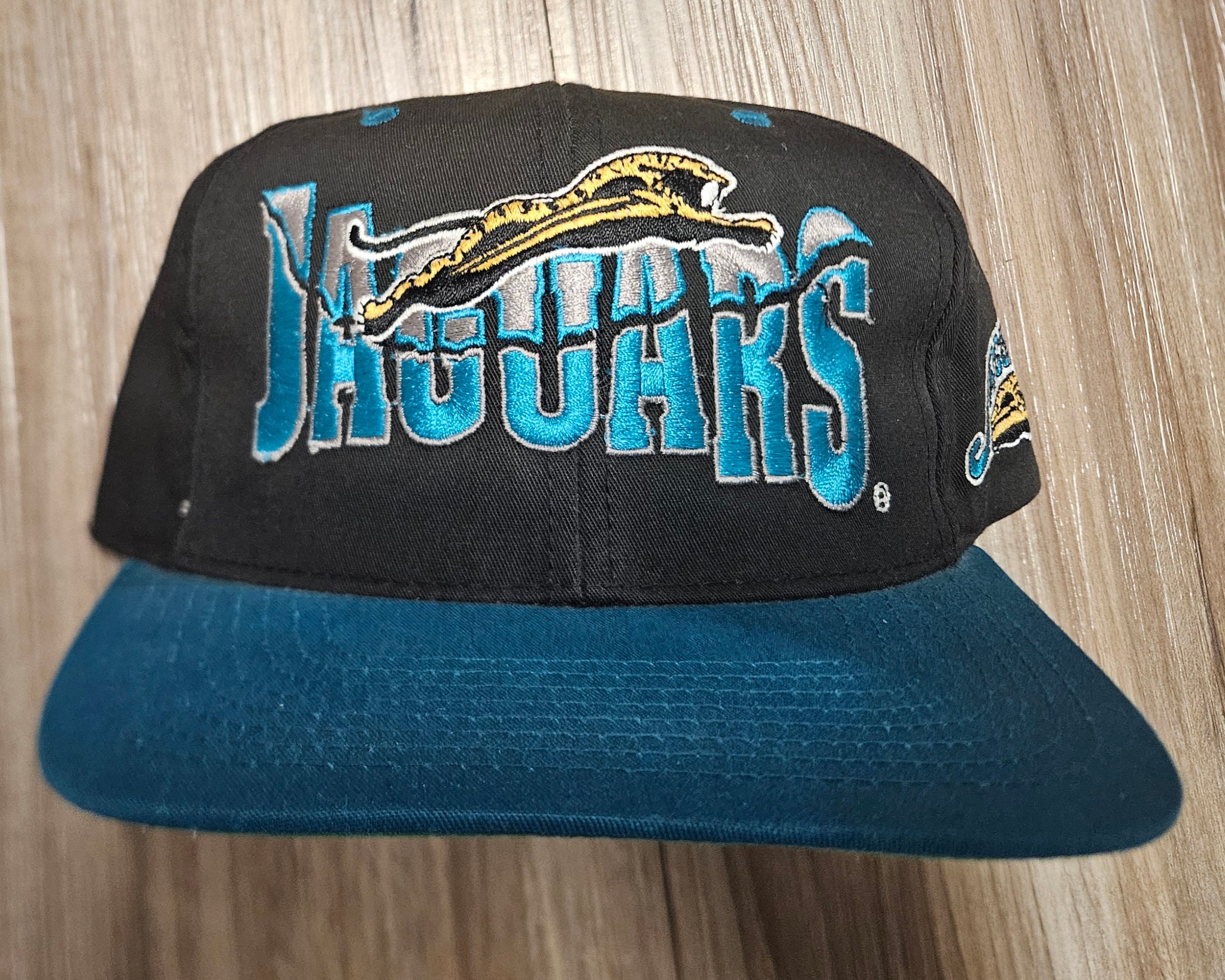 Jacksonville Jaguars Beanie Cream design with teal and gold‎ rhinestones, Logo Jacksonville Jaguars 2026 Sideline White 9SEVENTY Stretch  main image 2