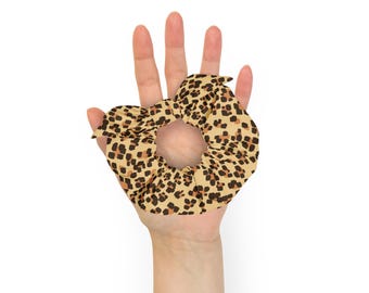 Coletero de poliéster reciclado: estampado de leopardo, detalle de lazo extraíble