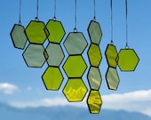 Free-form floating honeycomb suncatcher - two toned yellow glass