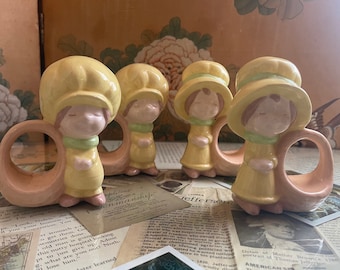 Vintage 1980’s Set of 4 Pioneer Children Napkin Holders Ceramic Wearing Yellow Bonnets and Hats Holding Baskets - 2 Boys & 2 Girls