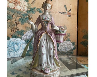 Antique Hand Painted Gold Gilt 6" Porcelain Figurine Made in Occupied Japan Victorian Lady w/ Star Detailed Dress Holding Bird