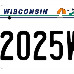 May include: White Wisconsin license plate with blue and green stripes and a small illustration of a red barn, a tent, and birds. The license plate number is 2025WI.