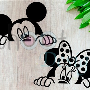 May include: Black and white silhouette of Mickey Mouse and Minnie Mouse peeking over a surface. Mickey Mouse is on the left and Minnie Mouse is on the right. Minnie Mouse has a polka dot bow.