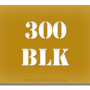 May include: Mustard yellow card with the white text "300 BLK" in a stencil font. The website address "DEMETERSWORKSHOP.COM" is at the bottom. The card has a textured appearance.