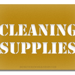 May include: Mustard yellow stencil with the words "CLEANING SUPPLIES" cut out in white. The text is in a bold, sans-serif font. The website address DEMETERSWORKSHOP.COM is at the bottom.
