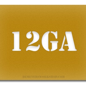 May include: Mustard-colored stencil with the text "12GA" cut out in white. The stencil has a textured surface and the website address DEMETERSWORKSHOP.COM is printed at the bottom.
