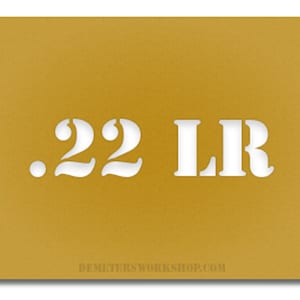 May include: Mustard-coloured card with the white text ".22 LR" cut out. The website address DEMETERSWORKSHOP.COM is printed in white at the bottom of the card.