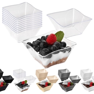 May include: Set of 10 clear plastic square bowls with a wavy edge. The bowls are stacked on top of each other. There are also bowls in black, white, and beige.