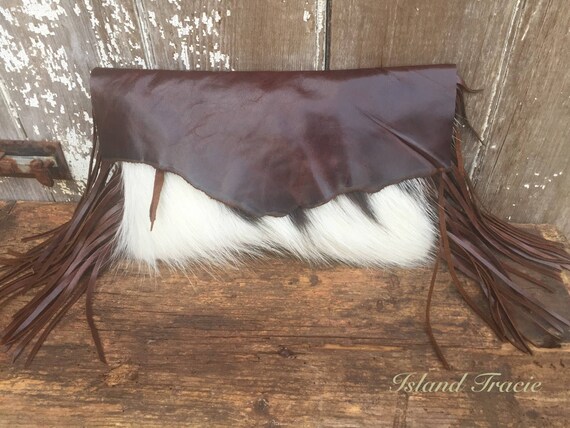 cowhide clutch bag