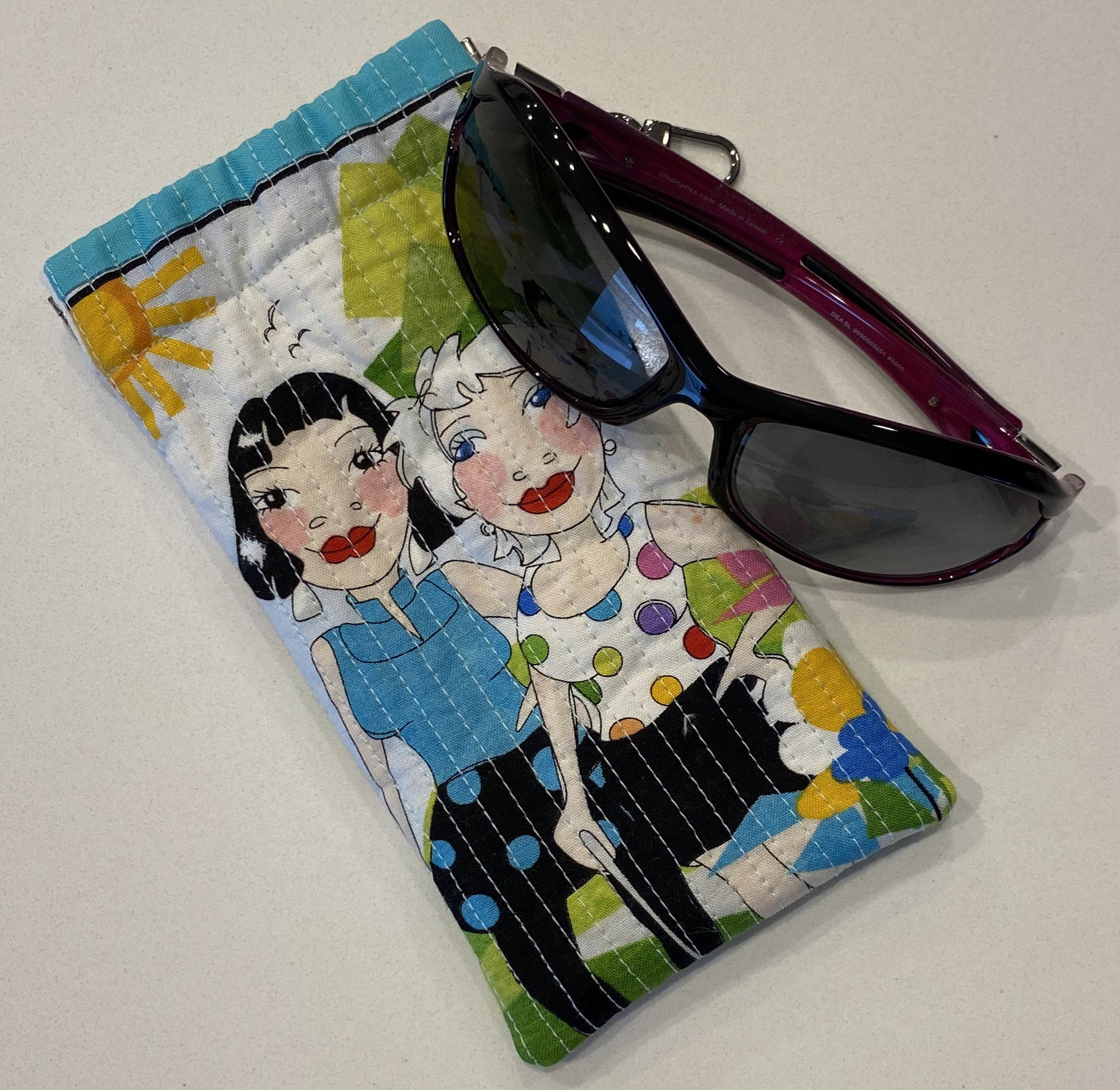 Quilted Sunglasses Case with FlexFrame closure