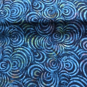 100% Cotton hand painted batik fabric by Nutex. Batik material, swirl. Abstract Suitable for patchwork, quilting, dressmaking etc. Dark Blue
