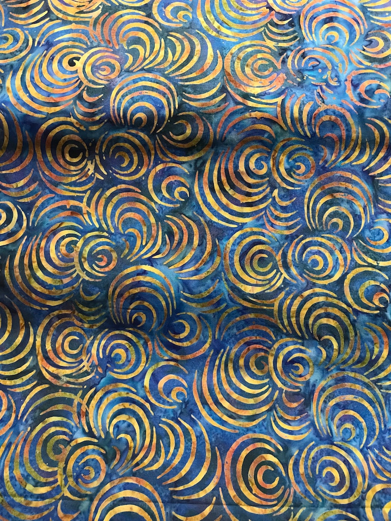 100% Cotton hand painted batik fabric by Nutex. Batik material, swirl. Abstract Suitable for patchwork, quilting, dressmaking etc. Blue with yellow