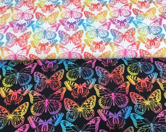Tela de mariposas arcoíris, algodón vibrante, material para acolchado.