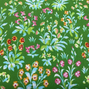 May include: Green fabric with a repeating pattern of small white, pink, orange, and yellow flowers. The flowers are arranged in clusters and are surrounded by green leaves.