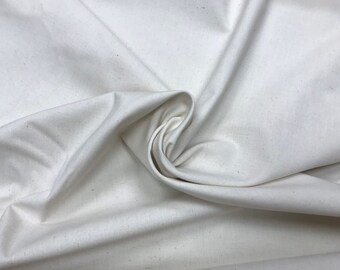 100% Cotton Pre washed Calico fabric. Plain natural colour, doll making, lining fabric, Suitable for cushions, toy making, linings etc.