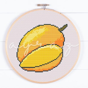 May include: A cross-stitch pattern of a yellow mango with a green stem. The mango is depicted in a realistic style with a slight orange hue.