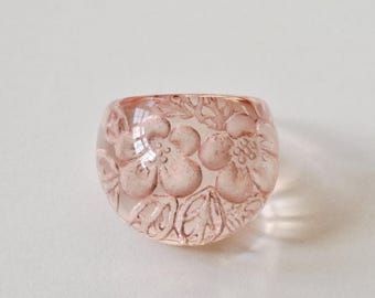 Pretty Pink Carved Flowers Perspex Ring.