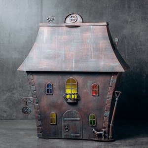 Handmade steel mailbox with copper color cat and dog. colored glass and LED lighting. Closed with a key