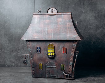 Handmade steel mailbox with copper color cat and dog. colored glass and LED lighting. Closed with a key