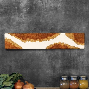 Wall hanging magnetic knife holder made of pieces of burl wood, in combination with white resin. Perfect gift for chefs & cooking enthusiasts.