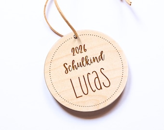 Personalized school cone pendant for 2026, featuring a name and made of wood.