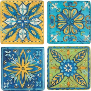 May include: Four square ceramic coasters with floral designs. Each coaster features a different colour scheme: yellow, turquoise, blue, and green. The designs include blue and white floral patterns with intricate details, ideal for home decor.