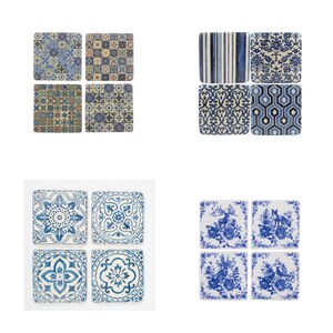 May include: Set of 12 blue and white ceramic coasters featuring a variety of patterns, including geometric designs, floral motifs, and stripes. The coasters are square shaped and have a rustic, vintage look.