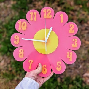 Glow in the Dark Blacklight Retro Daisy Wall Clock - Pink and Orange