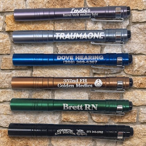 Custom Engraved LED Penlight  with batteries, makes a great personalized gift.  Bulk buying options in listing and available in 6 colors